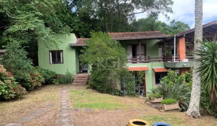 Terreno de 5.280 m², com 3 casas, no bairro Ponta Grossa, em Porto Alegre.&lt;BR&gt;Casa 01 grande (112 m²) - Em alvenaria, com 02 dormitórios (01 deles tem 48m²), 02 banheiros, cozinha, lavanderia, s