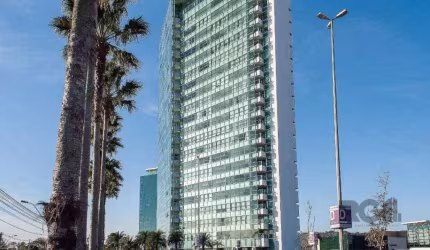 Studio  no residence  du lac, com 52m2, sacada e vista para o guaíba e do shopping barra sul. Com cama box casal, 2 armários com espelhos sob medida, sofá, 2 split, televisão 4k,  banheiro com bancada