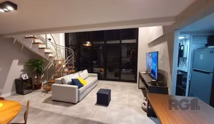 Excelente Oportunidade! São apenas 2 unidades Duplex em todo empreendimento!! Imóvel moderno, com pé direito duplo, andar alto, vista definida, amplo living com dois ambientes, churrasqueira, todo em 