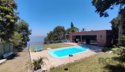 Propriedade com praia particular e possível uso como local de eventos&lt;BR&gt;&lt;BR&gt;Vende-se propriedade com praia particular às margens do Guaíba, junto à Mata Atlântica, no bairro Ponta Grossa,