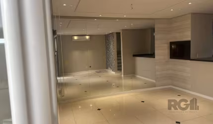 Casa à venda em condomínio fechado  com 3 dormitórios no bairro Ecoville, suíte, sótão com banheiro podendo ser uma segunda suíte, living com lavabo, espaço gourmet com churrasqueira, pátio, cozinha c