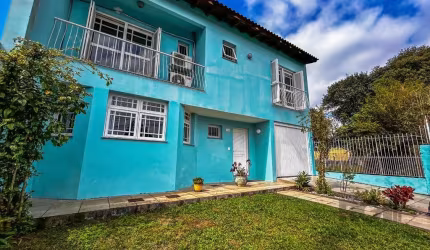 Casa com 4 quartos, suítes, vaga de garagem, no bairro Vila Nova, Porto Alegre/RS  &lt;BR&gt; &lt;BR&gt;Esta casa moderna e espaçosa oferece 4 dormitórios, sendo 2 suítes privativas e 2 quartos com su