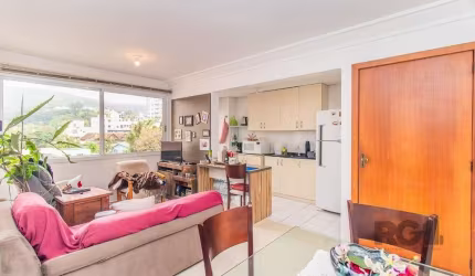 Apartamento de 2 dormitórios no condomínio Urbano Ipiranga, próximo a PUC RS e de facil acesso a todas as comodidades do bairro. Living com 2 ambientes, cozinha americana com armários, área de serviço