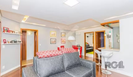 Apartamento 3 dormitórios no bairro Auxiliadora! Condomínio de 8 pavimentos, sendo 2 unidades por andar, portaria 24 horas, elevador social e de serviço, salão de festas, piscina, sauna, estacionament