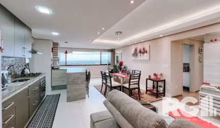 Apartamento com 3 dormitórios (1 suíte), 2 vagas cobertas individuais, 94,54 m² de área privativa, churrasqueira, cozinha americana integrada com o living, andar alto com vista panorâmica e posição so