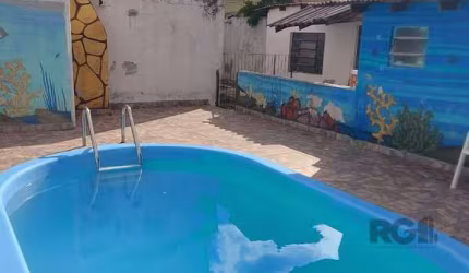 Casa com 4 quartos, suíte, vagas de garagem, piscina, hidromassagem, lareira, no bairro Aberta dos Morros, Porto Alegre/RS&lt;BR&gt;&lt;BR&gt;Casa ampla e bem planejada, ideal para famílias que buscam
