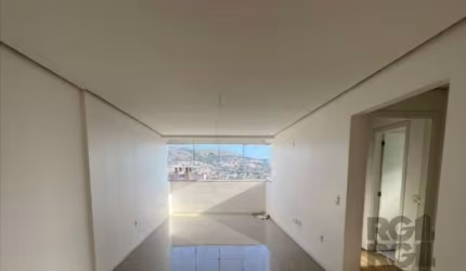 Apartamento 79,85 privativos, frente, 2 dormitórios (1 suíte), living para 2 ambientes, churrasqueira, banheiro social com ventilação natural, cozinha americana e área de serviços. 2 vaga de garagem s