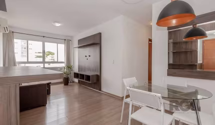 Venha conhecer este incrível apartamento à venda no bairro Cristo Redentor, em Porto Alegre, RS! Com dois dormitórios e dois banheiros sendo uma suíte, este espaço de 66,32 m² oferece um layout modern