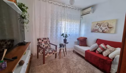 Apartamento 3 dormitorios, 1 vaga, 1 banheiro, vila Nova, Porto Alegre, RS&lt;BR&gt;&lt;BR&gt;Excelente apartamento de 3 amplos dormitórios, decorado com muito bom gosto.&lt;BR&gt;Imóvel possui cozinh