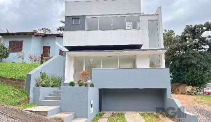 Casa Condominio em Porto Alegre, no bairro Hípica, com 3 dormitório(s), à venda.