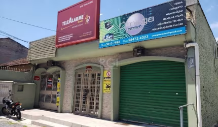 Casa com 3 dormitórios  e 3 lojas comerciais no bairro Passo da areia Porto Alegre RS
