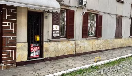 Vende-se apto térreo, com 03 dormitórios, sala com 02 ambientes
