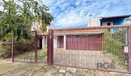 Casa em Porto Alegre, no bairro Guarujá, com 3 dormitório(s), à venda.