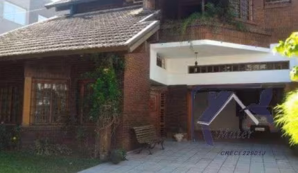 Casa 3 dormitórios, 2 suítes, 3 vagas de garagem, no bairro Tristeza, Porto Alegre/RS.  &lt;BR&gt;&lt;BR&gt;Belíssima residência!!!Linda casa de  alvenaria com paredes duplas, cinco dormitórios, sendo