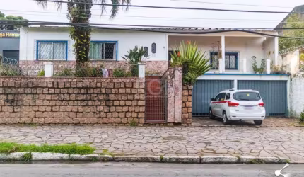 Casa com 03 dormitórios, sendo 01 suíte, living com 02 ambientes, sala de jantar, escritório cozinha ampla e área de serviço. A casa é totalmente térrea todos os cômodos em um só pavimento .&lt;BR&gt;
