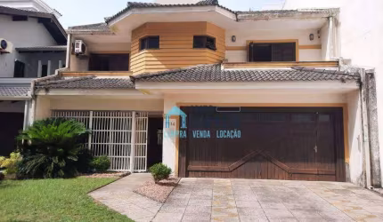 Sobrado com 4 dormitórios(sendo 2 suítes) à venda por R$ 960.000 - Centro - Tramandaí/RS