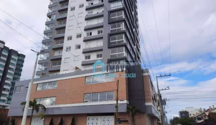 Apartamento mobiliado e decorado 2 dormitórios(sendo 1 suíte), à venda por R$ 790.000 - Centro - Tramandaí/RS