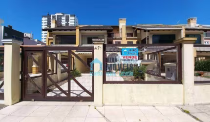 Sobrado Triplex com 5 dormitórios à venda por R$ 850.000 - Centro - Tramandaí/RS