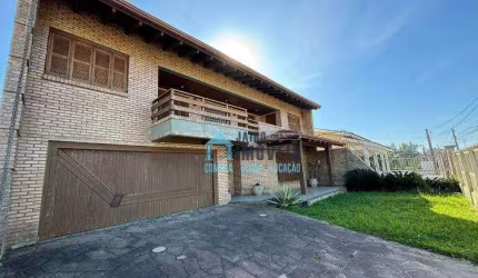 Casa com excelente padrão construtivo em avenida Central, à venda, por R$ 690.000 - Centro - Balneário Pinhal/RS
