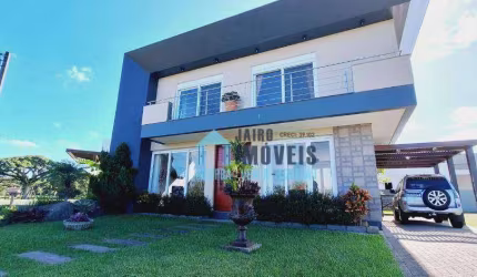 Casa com 3 dormitórios à venda, 213 m² por R$ 1.566.000,00 - Tramandaí - Tramandaí/RS