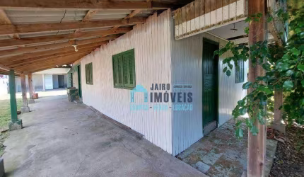Terreno com 2 casas, uma em alvenaria e uma em madeira, à venda por R$ 110.000 - Balneario Pinhal - Balneário Pinhal/RS