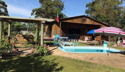 Belíssimo Sítio com duas casas e grande área de lazer, à venda, por R$ 1.250.000 - Rancho Velho - Capivari do Sul/RS