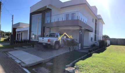 Casa com 4 dormitórios sendo 3 suítes à venda, por R$ 2.200.000 - Marítimo - Tramandaí/RS