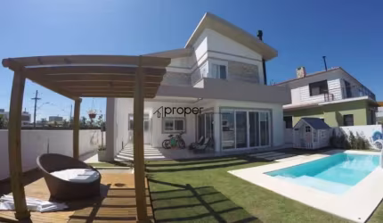 Casa excepcional no Alphaville Fundo Lago- Mobiliada, 3 dormitórios com suíte, 3