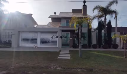 Sobrado com 4 dormitórios à venda, 262 m² por R$ 1.690.000,00 - Laranjal - Pelot