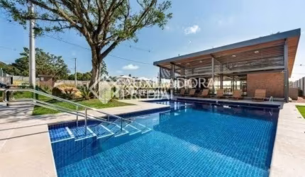 Terreno em condomínio fechado à venda na Estrada Caminho do Meio, 2259, Cocão, Viamão, 180 m2 por R$ 230.000