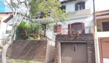 Casa em condomínio fechado com 4 quartos à venda na Rua Nero José da Silva Filho, 205, Partenon, Porto Alegre, 260 m2 por R$ 650.000