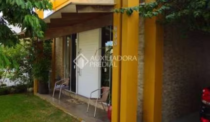 Casa em condomínio fechado com 3 quartos à venda na Tapir Rocha, 8500, São Lucas, Viamão, 150 m2 por R$ 990.000
