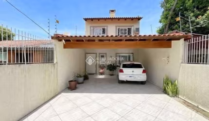 Casa com 3 quartos à venda na Rua Luiz Batista Bertaco, 41, Serraria, Porto Alegre, 136 m2 por R$ 349.000