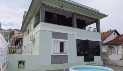 Casa com 5 quartos à venda na Rua Oscar Tollens, 98, Santa Tereza, Porto Alegre, 400 m2 por R$ 750.000