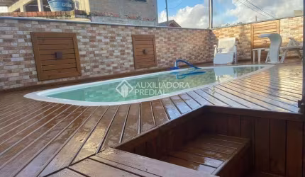 Casa com 3 quartos à venda na Rodovia Evádio Paulo Broering, 5236, Passagem de Maciambú (Ens Brito), Palhoça, 63 m2 por R$ 399.000