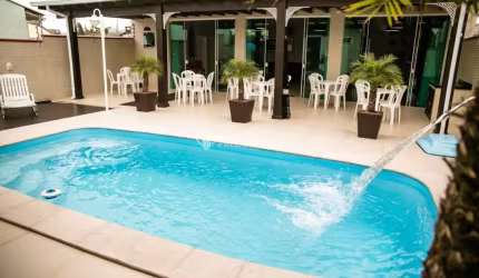 Casa com 3 quartos à venda na Pioneiro, 186, Enseada de Brito, Palhoça, 220 m2 por R$ 850.000