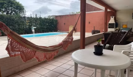 Casa com 3 quartos à venda na Rua Tucumã, 379, Enseada de Brito, Palhoça, 360 m2 por R$ 795.000