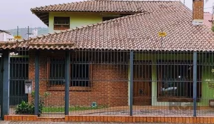 Casa de 3 dormitórios e 2 suítes no Bairro Partenon