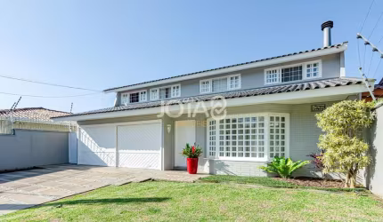Linda casa em rua tranquila no Jardim Botânico! J8
