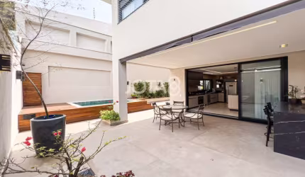 Casa nova em condomínio com 5 suítes - Jota8
