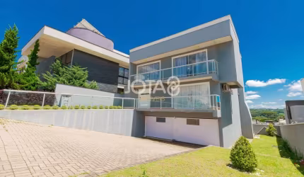 Casa em condomínio clube em Santa Felicidade - J8