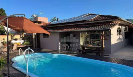 Casa com 3 dormitórios à venda, 360 m² por R$ 900.000,00 - Enseada de Brito - Palhoça/SC