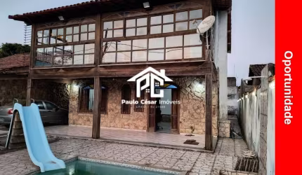 Casa com 4 quartos sendo 3 suítes, sala com lareira, cozinha, banheiro social, área de serviço, garagem, piscina, churrasqueira e ótimo quintal.