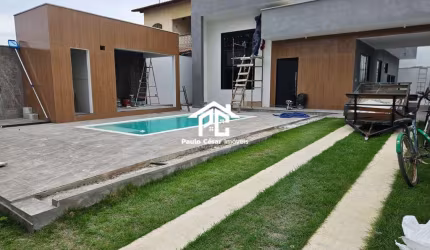 Casa à venda em Araruama-RJ, Vila Capri: 3 quartos, 2 suítes, 2 salas, 1 banheiro, 1 vaga de garagem, 140m² de área.