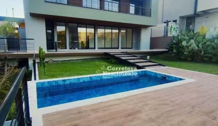 Casa com 4 dormitórios à venda, 370 m² por R$ 4.500.000,00 - Condomínio Reserva do Paratehy - São José dos Campos/SP