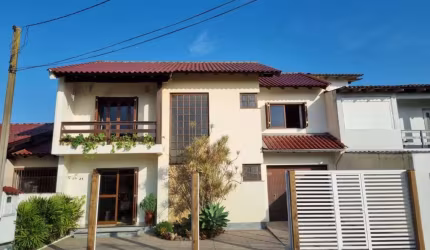 Casa/Sobrado com 3 dormitórios à venda, 178 m² por R$ 798.000 - Girassol - Gravataí/RS