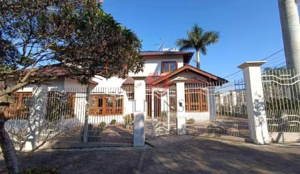 Sobrado com 4 dormitórios à venda, 427 m² por R$ 2.200.000,00 - Centro - Gravataí/RS
