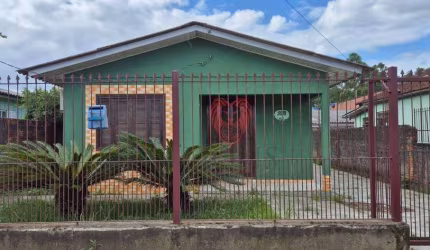 Casa com 2 dormitórios à venda, 137 m² por R$ 329.800 - Novo Mundo - Gravataí/RS