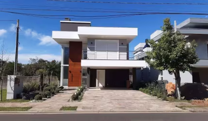 Sobrado com 3 dormitórios à venda, 215 m² por R$ 2.490.000,00 - Alphaville - Gravataí/RS
