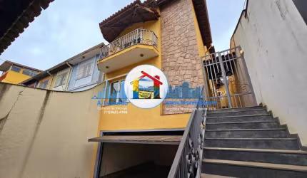 Belo sobrado com 3 suítes, varanda, lareira, edícula e 5 vagas no Jabaquara